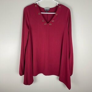 Allison Brittney Red Grommet Sharkbite hem blouse top